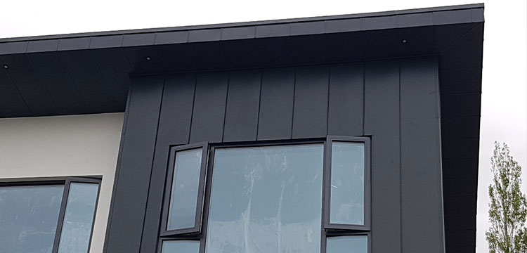 TATA Colorcoat Urban metal roof and vertical installation and Alkorplan 35176 reinforced pvc on private house