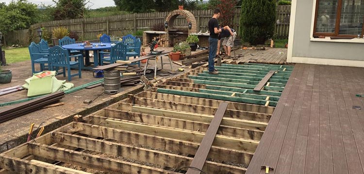 installation of teranna ever shield walnut composite decking that looks and feels like natural wood