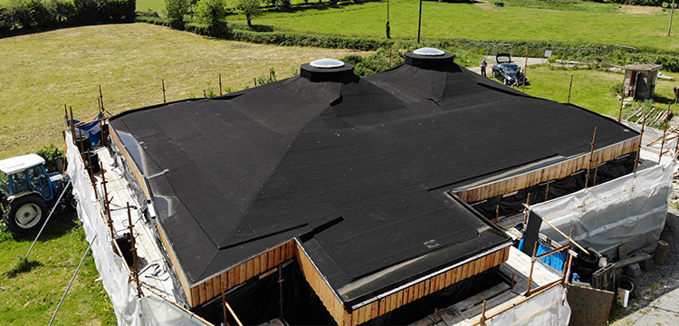 Atypical Roof Construction – Roundwood Straw Bale House